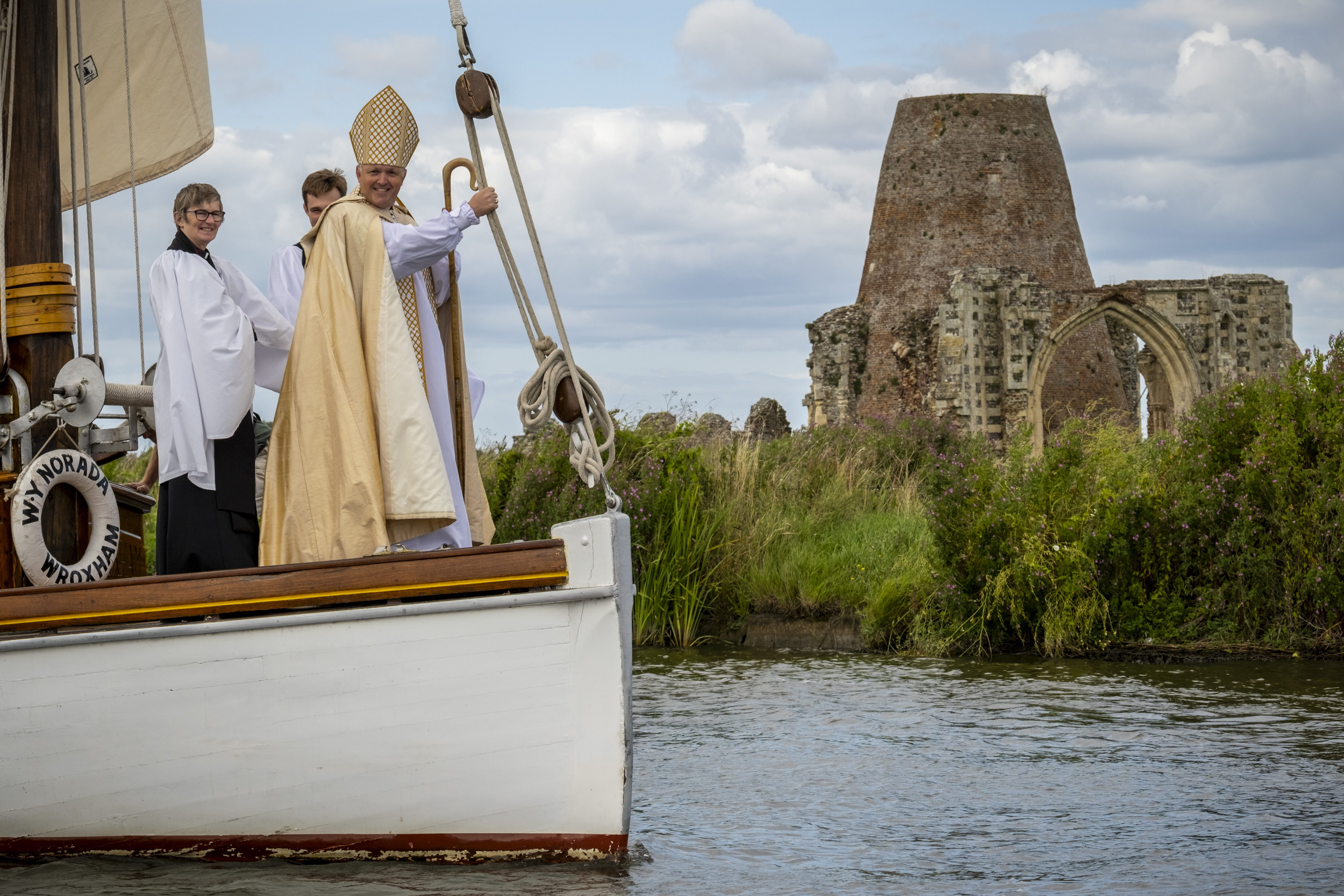 Riverside service in Norfolk abbey ruins