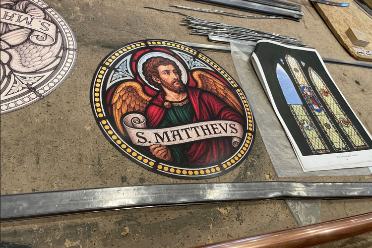 Stained glass saint returns to West Norfolk church